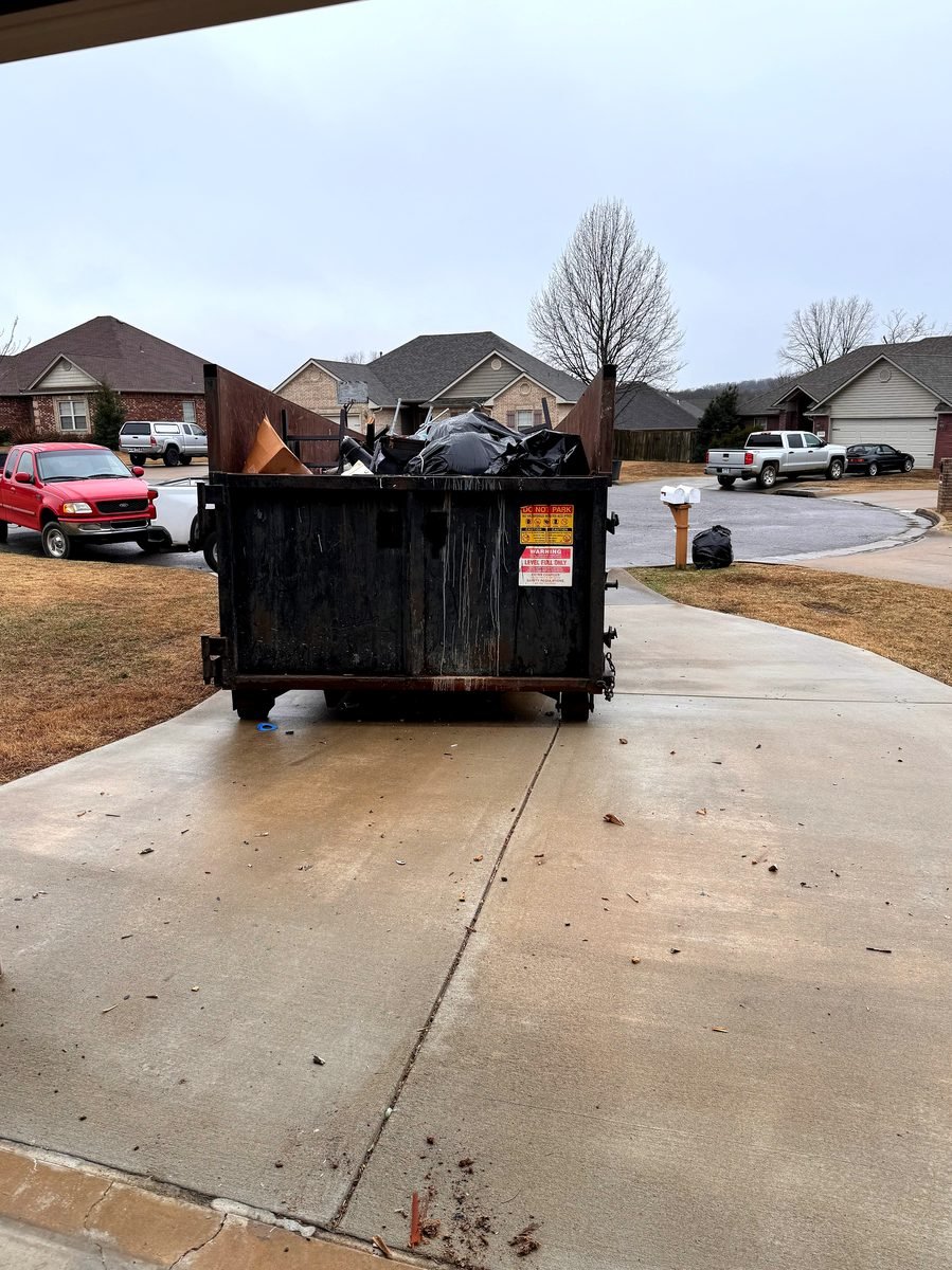Treasure Valley Bin Co. roll-off delivery truck and driver operating in Boise